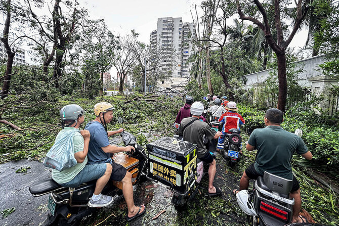 China’s ‘Hawaii’ under water as tropical storm dumps record rainfall